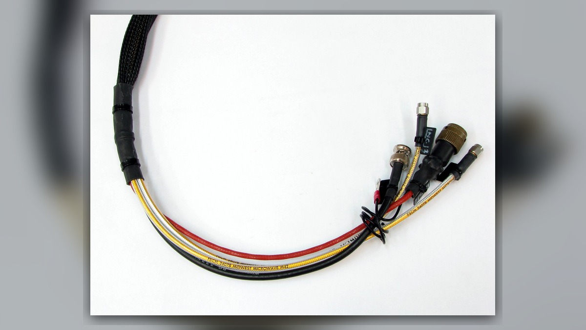 What is the reason for a robot alarming only in specific postures? Inspection of body cables and connectors